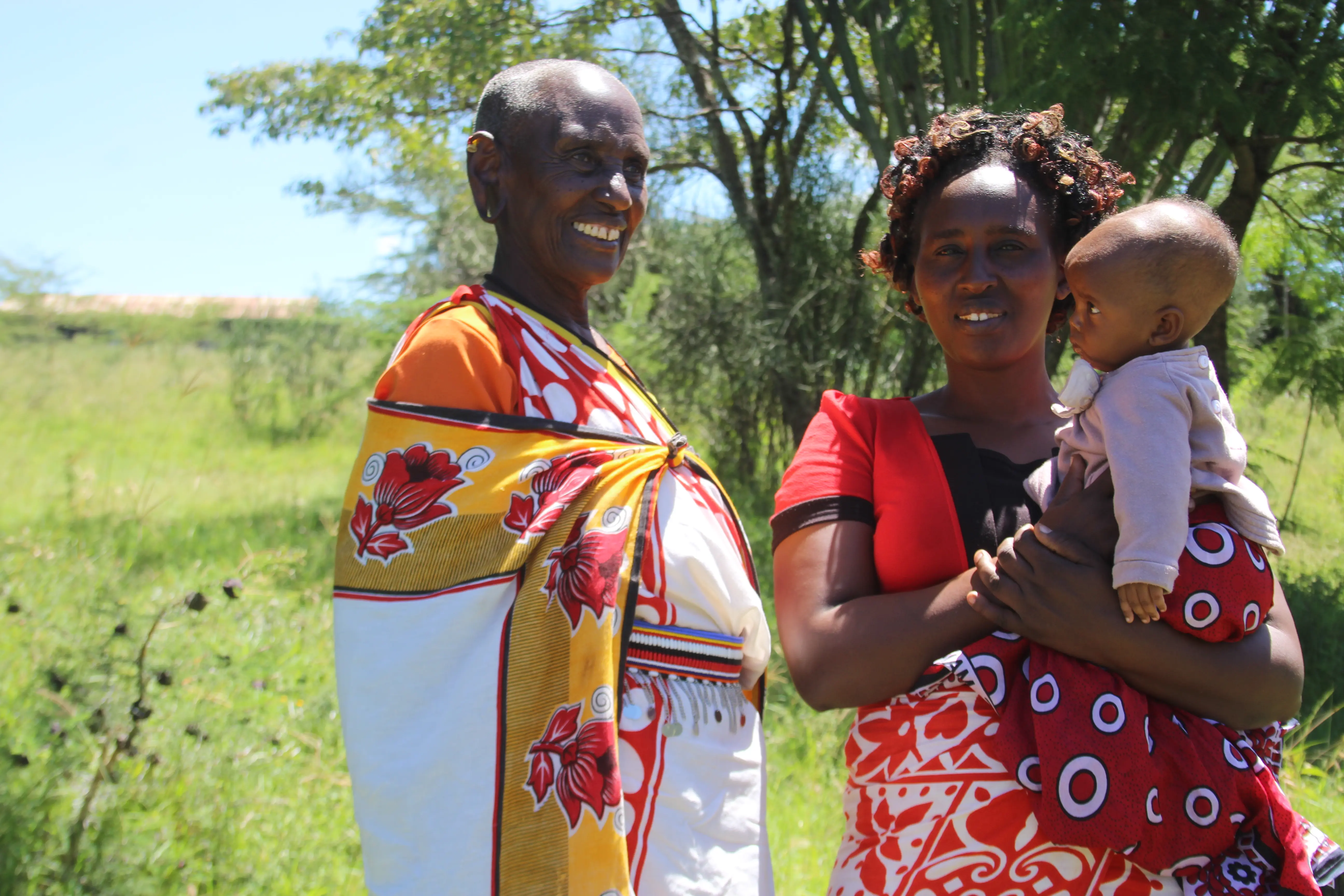 Mama Pauline Parkei with one of her clients at her home in Olasit area in Narok East Sub County