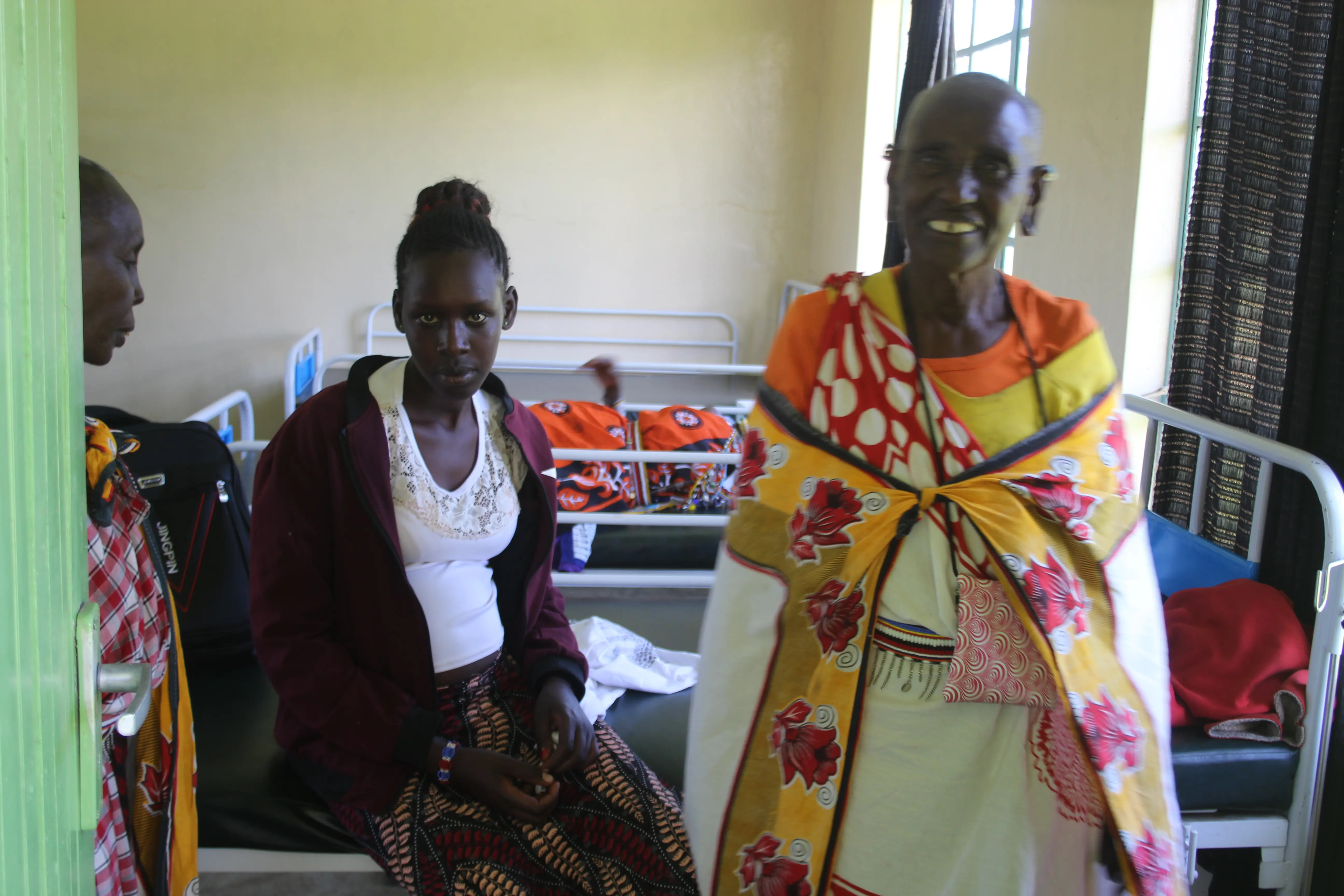 Mama Pauline Parkei (right) at the maternity ward in Olasiti health center