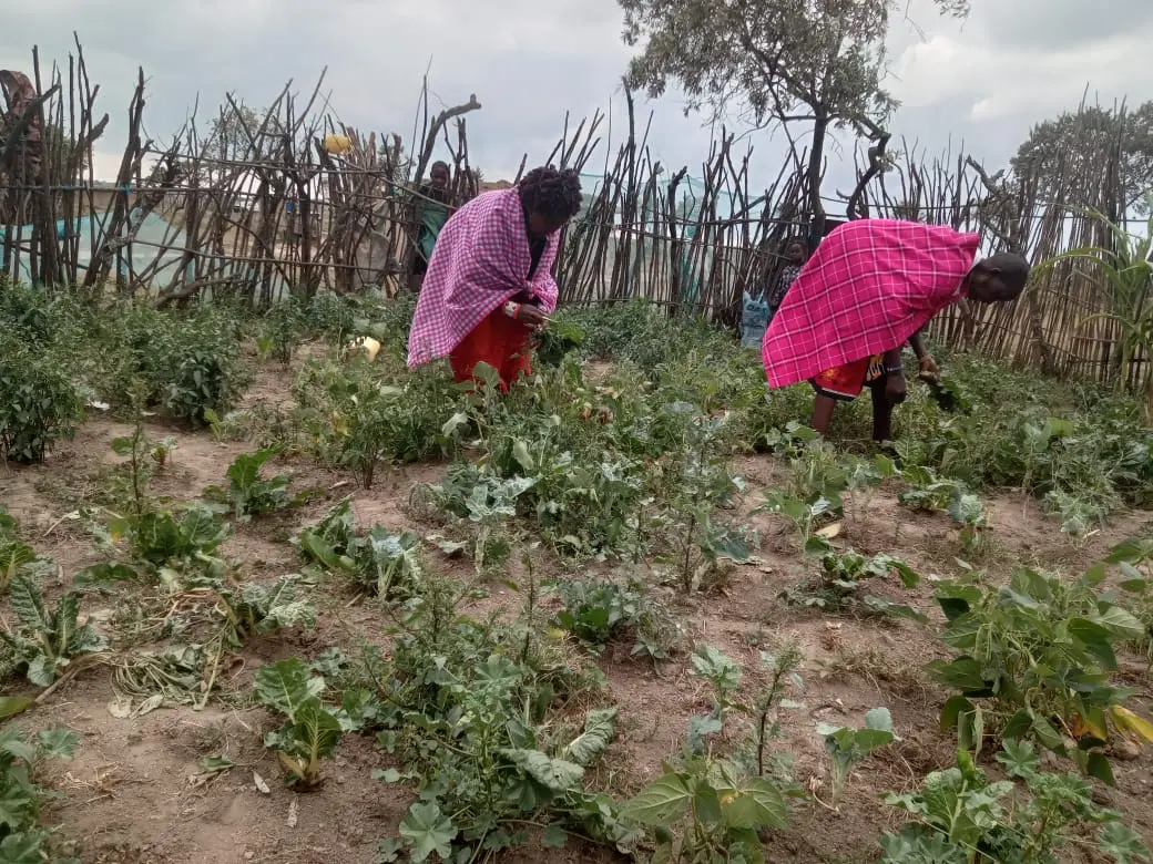 Caregiver Kisaru in the garden